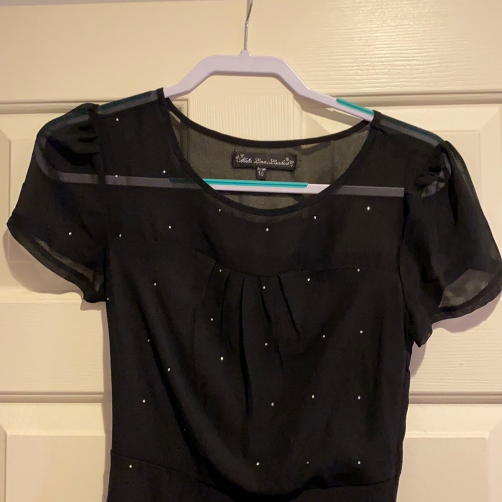 Black short dress with sparkles. Size: 10 EU 38.